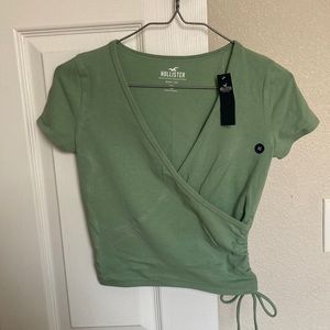 Hollister green wrap baby tee with a cinched side